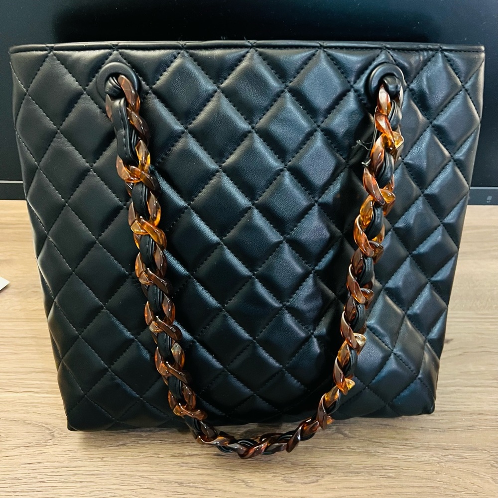 Black puffy purse